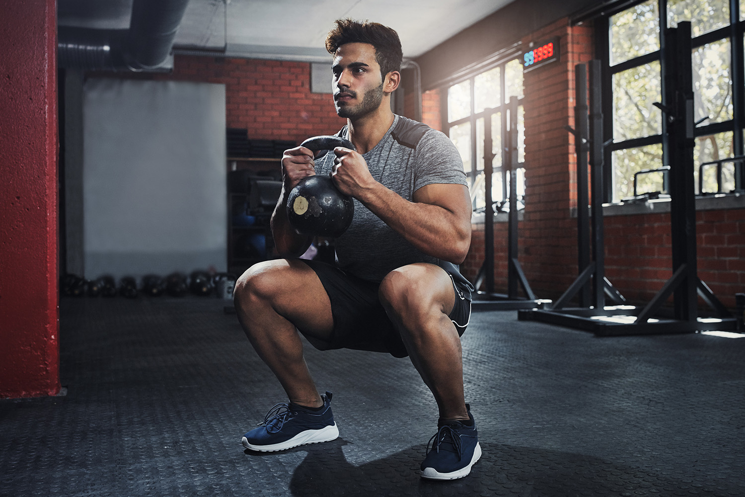 Man doing goblet squats