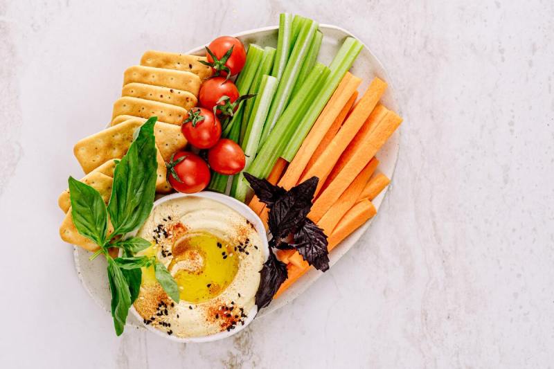 Hummus, veggies, and crackers.