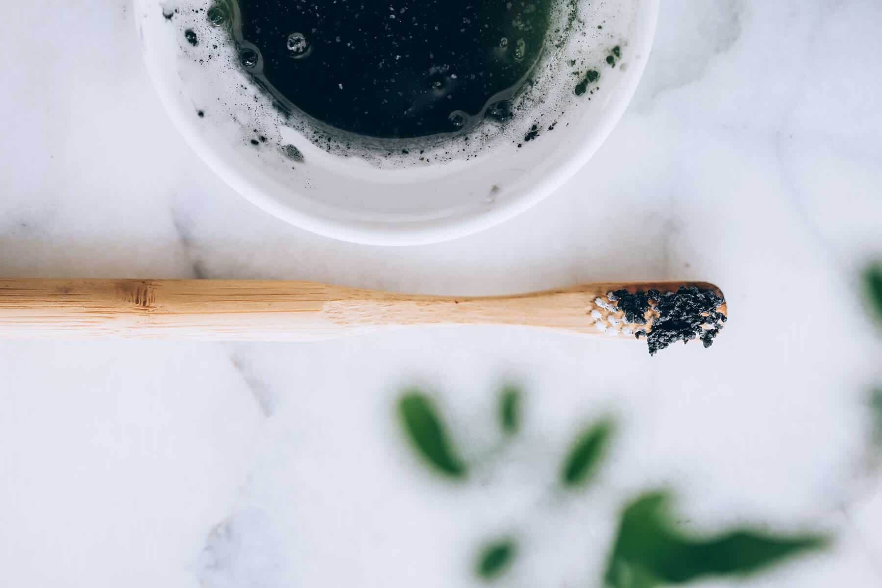 Whiten teeth with activated charcoal
